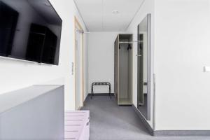 TV a/nebo společenská místnost v ubytování Best Western Plus Airport Hotel