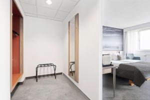 Postel nebo postele na pokoji v ubytování Best Western Plus Airport Hotel