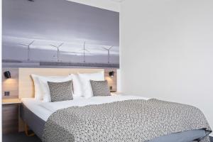 Postel nebo postele na pokoji v ubytování Best Western Plus Airport Hotel