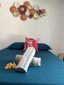 מיטה או מיטות בחדר ב-Bora Bora Hiva Home