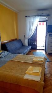 Ein Bett oder Betten in einem Zimmer der Unterkunft Apartment in Jadranovo with sea view, balcony, air conditioning, Wi-Fi (3856-2)