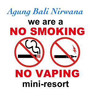 a sign that says no smoking and mini resort at Agung Bali Nirwana Villas and Spa in Tejakula