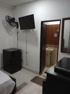 TV o dispositivi per l'intrattenimento presso Hotel Bethesda 316 a 822 a 1980