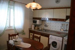 Kuchyňa alebo kuchynka v ubytovaní Vivienda Vacacional Paseo Mirabal