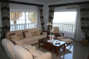 Posedenie v ubytovaní Vivienda Vacacional Paseo Mirabal