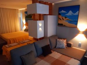 Ένα ή περισσότερα κρεβάτια σε δωμάτιο στο Ilusion Flats Aconchego de Ponta Negra +37 φωτογραφίες