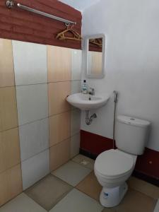 Baðherbergi á Omah Singo Stay & Resto Yogyakarta
