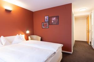 Self Check-In Hotel David 22客房内的一张或多张床位