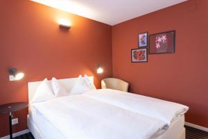 Self Check-In Hotel David 22客房内的一张或多张床位