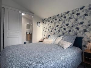 Łóżko lub łóżka w pokoju w obiekcie La Villa Morey