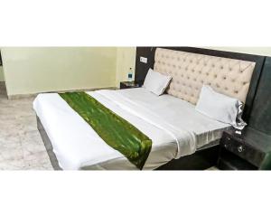 Cama ou camas em um quarto em Hotel Pacific Green By WB Inn