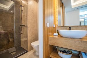 Kúpeľňa v ubytovaní Olivia Suites Apartments