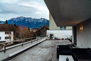 a balcony with a view of mountains at -City-Apartment, Buchs SG, Skie, Wanderroute, WiFi- in Buchs