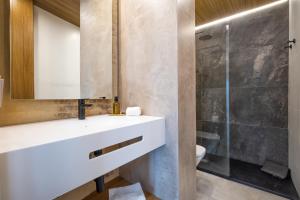 Kúpeľňa v ubytovaní Olivia Suites Apartments