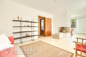 A seating area at Casa con accesso diretto al mare by LoveSud