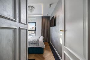 Posteľ alebo postele v izbe v ubytovaní Luxury Apartment with SAUNA - Old Town - GOLD