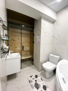 Kylpyhuone majoituspaikassa Central City Apartments