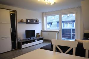 TV a/nebo společenská místnost v ubytování Melina