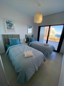 Postel nebo postele na pokoji v ubytování Infinity View SNB + 60 fotografií