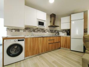 Kuchyň nebo kuchyňský kout v ubytování Nerja Sun Apartment Bronce A Centro
