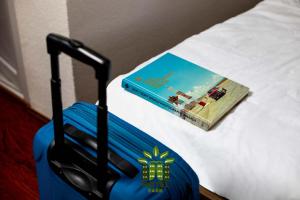 Postel nebo postele na pokoji v ubytování Hotel Park