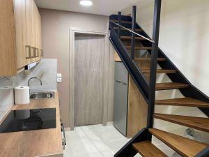 Kuchyňa alebo kuchynka v ubytovaní Luxury Loft Kalu Tsesme A