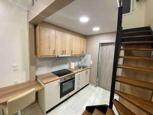 Kuchyňa alebo kuchynka v ubytovaní Luxury Loft Kalu Tsesme A