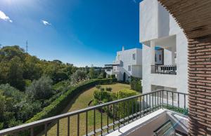 A balcony or terrace at Los Eucaliptos Appartement deux chambres Chez Stefan