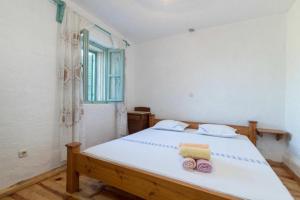Posteľ alebo postele v izbe v ubytovaní Lavender Cottage