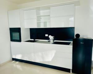 A kitchen or kitchenette at Loft Terracina