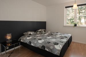 Postel nebo postele na pokoji v ubytování Guesthouse Tradsborgvej