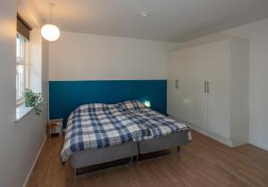 Postel nebo postele na pokoji v ubytování Guesthouse Tradsborgvej
