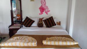 Postel nebo postele na pokoji v ubytování Secret View Homestay Ella