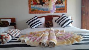 Postel nebo postele na pokoji v ubytování Secret View Homestay Ella