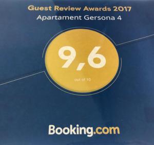 a yellow sign that reads guest review awards participant specimen at Apartament Gersona 4 in Bydgoszcz