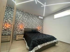 A bed or beds in a room at Casa Vacanze Alla Zisa