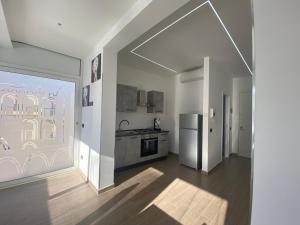 A kitchen or kitchenette at Casa Vacanze Alla Zisa
