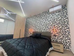 A bed or beds in a room at Casa Vacanze Alla Zisa