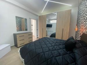 A bed or beds in a room at Casa Vacanze Alla Zisa