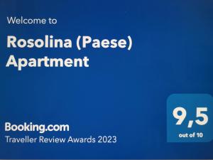 a blue screen with the text welcome to rosslynina pause appointment at Rosolina (Paese) Apartment in Rosolina