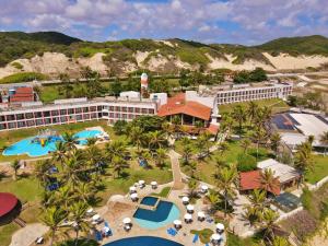 an aerial view of a resort with two pools at El Aram Imirá Beach Resort in Natal +32 photos