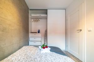 Posteľ alebo postele v izbe v ubytovaní Apartament Sobieskiego 2a Parking gratiss