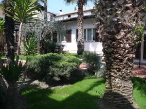 Vonkajšia záhrada v ubytovaní Oasi Holiday Home