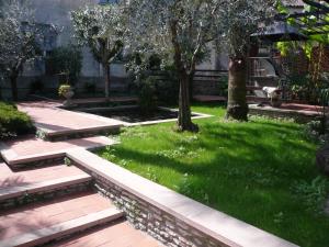 Vonkajšia záhrada v ubytovaní Oasi Holiday Home