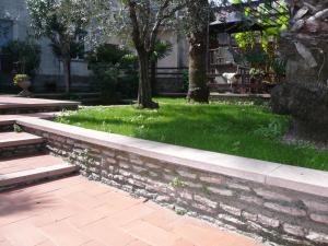 Vonkajšia záhrada v ubytovaní Oasi Holiday Home