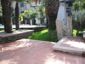 Vonkajšia záhrada v ubytovaní Oasi Holiday Home