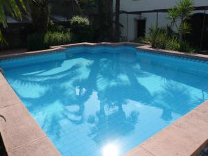 Bazén v ubytovaní Oasi Holiday Home alebo v jeho blízkosti