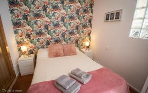 Giường trong phòng chung tại Estudio frente al mar