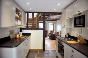 A kitchen or kitchenette at No 4 The Forge Coniston
