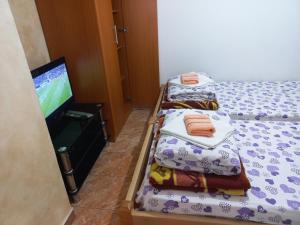 Letto o letti in una camera di Apartmani Sobe Sljivancanin